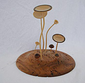 Wooden saucer with wooden mushrooms